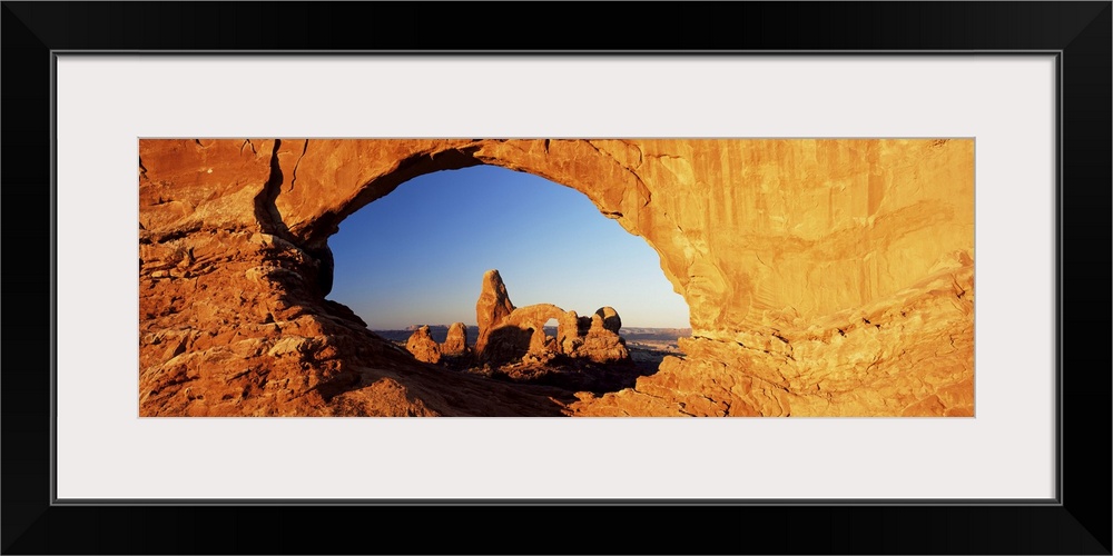 Turret Arch through North Window at sunrise, Arches National Park, Moab, Utah