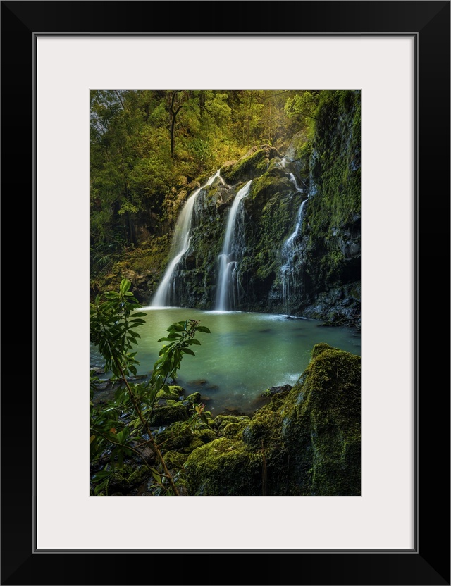 Upper Waikani Falls (Three Bears Falls) in soft sunset light catching early evening mist, Maui, Hawaii, United States of A...