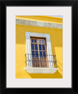 White window of yellow house, Oaxaca, Mexico
