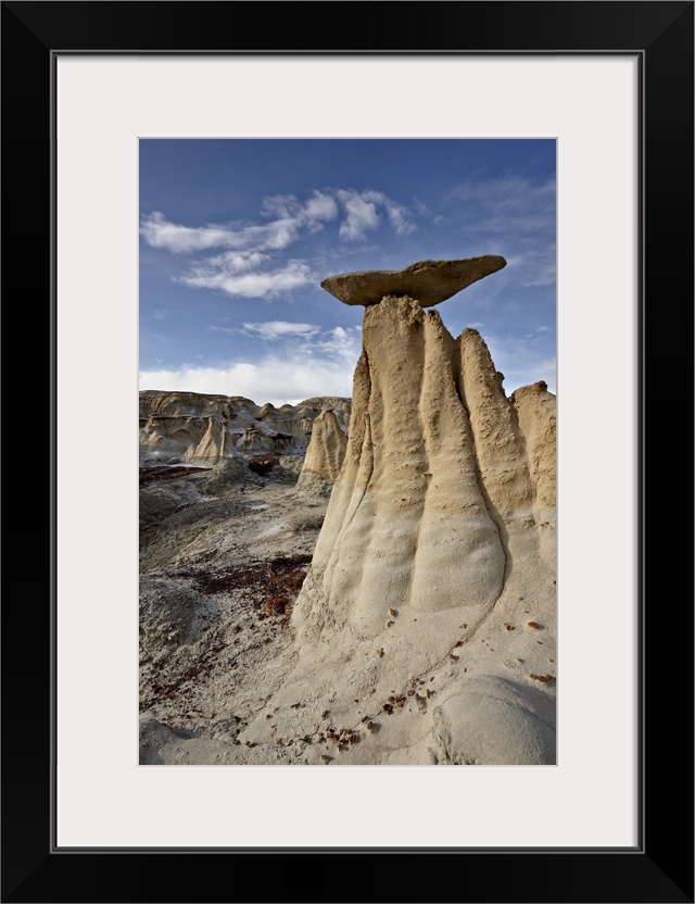 Yellow hoodoos under clouds, San Juan Basin, New Mexico