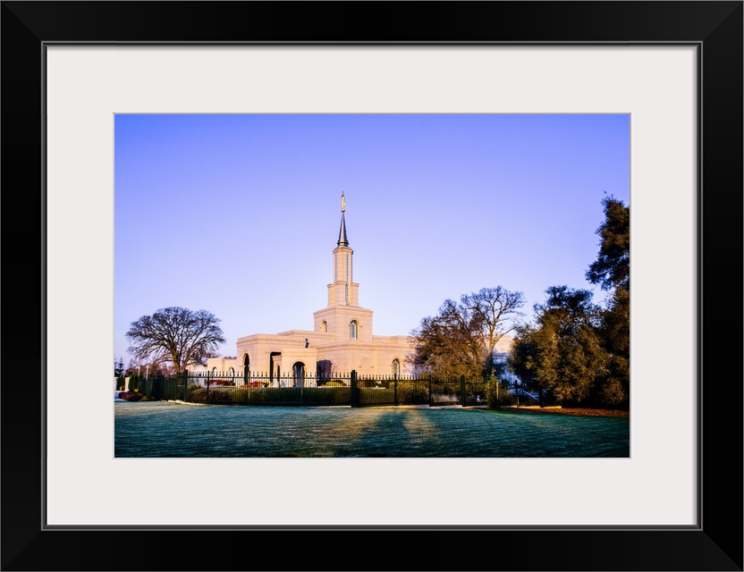 The Sacramento California Temple overlooks Lake Natoma from the hill where it sits. The Sierra Nevada Mountains can be see...