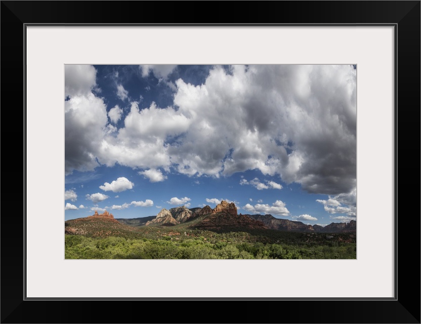 Clouds and red rocks at sunset in Sedona, Arizona.