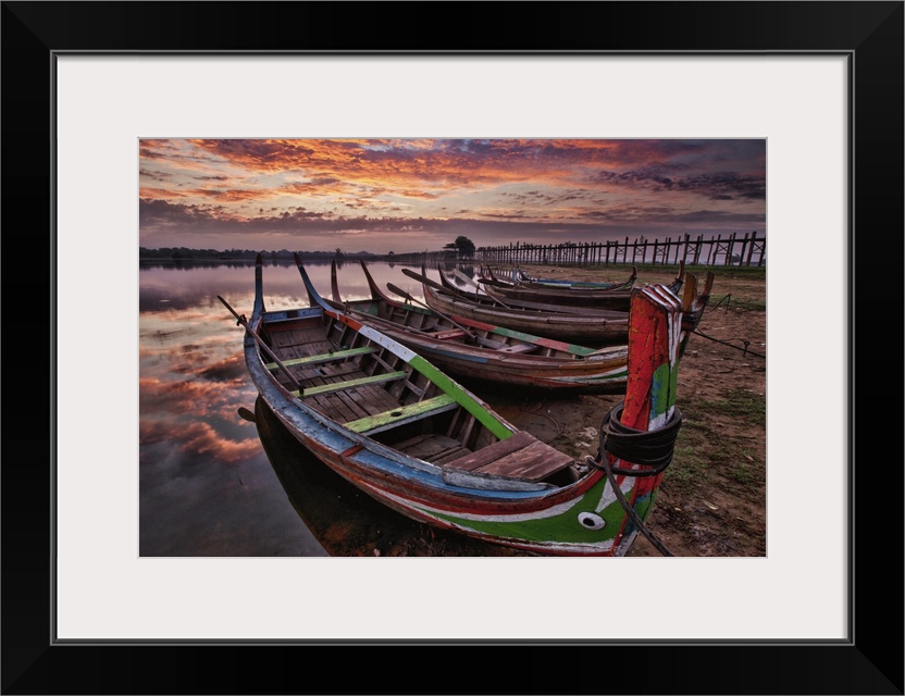 Longtail boats by the Ubein bridge in Mandalay, Burma