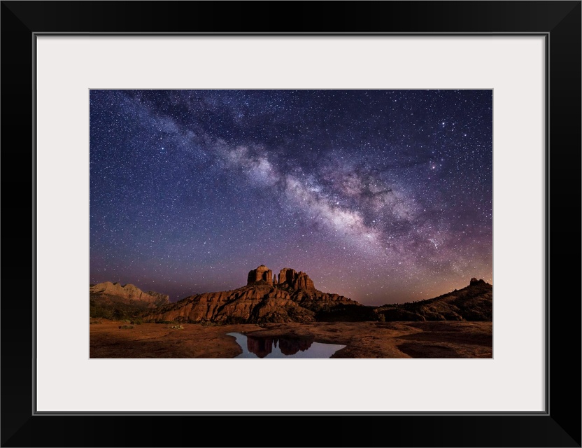 Milky Way and moonlight over Cathedral Rocks in Sedona, Arizona.