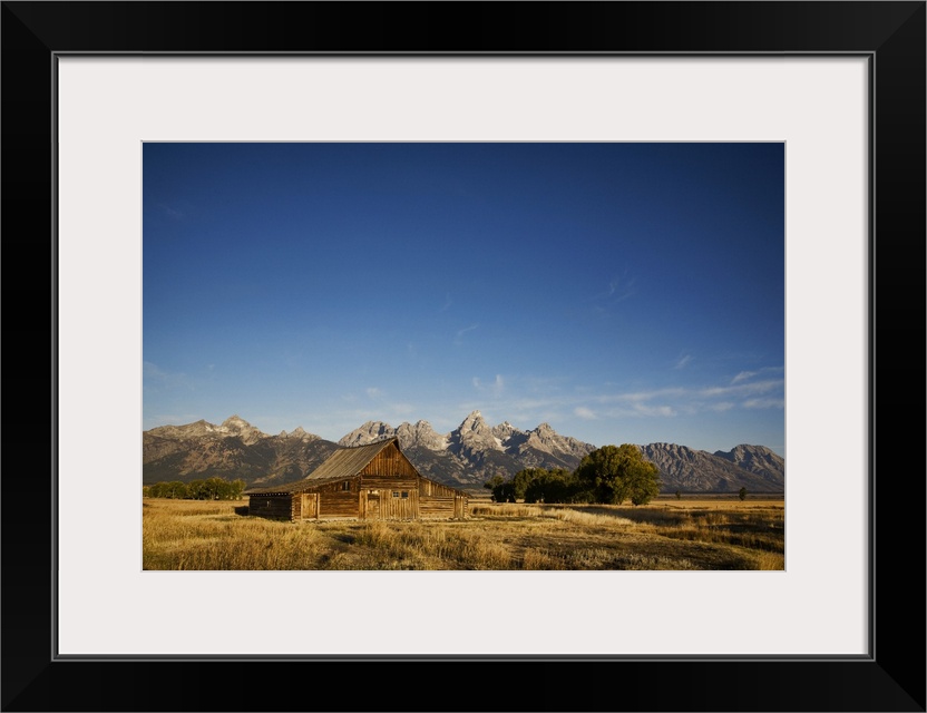 Mormon row barns at sunset, Jackson Hole, Wyoming