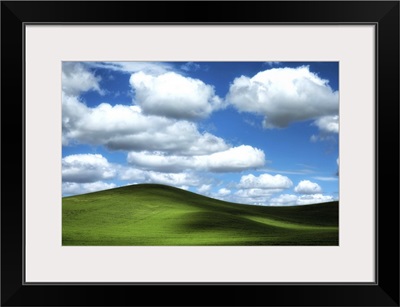 Powerful clouds and green wheat fields in the Palouse region of Washington