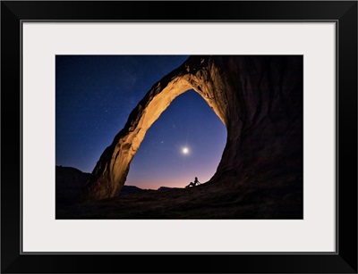 Silhouette Of A Woman Under Corona Arch In Moab, Utah