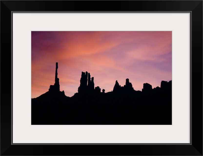 Sunrise at Totem Pole and Y'ei Bi Chei in Monument Valley, Arizona