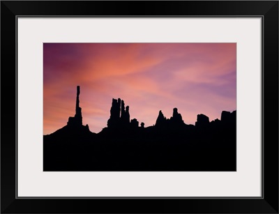 Sunrise at Totem Pole and Y'ei Bi Chei in Monument Valley, Arizona