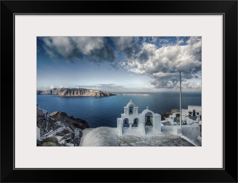 Sunset and church on Oia, Santorini, Greece