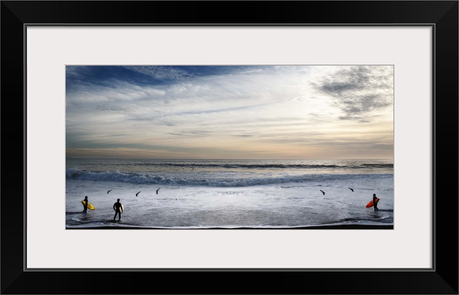 Surfers in Malibu looking at the waves