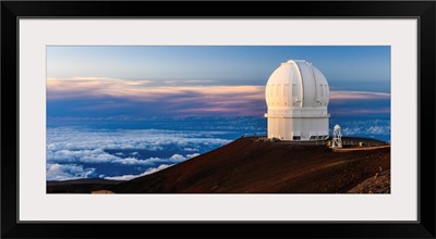 An Observatory Atop Hawaii's Mauna Kea At Sunset