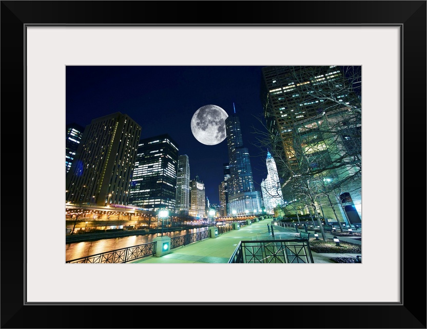 Chicago at Night. Shot Taken from Chicago Famous Riverwalk. Large Moon on the Sky.