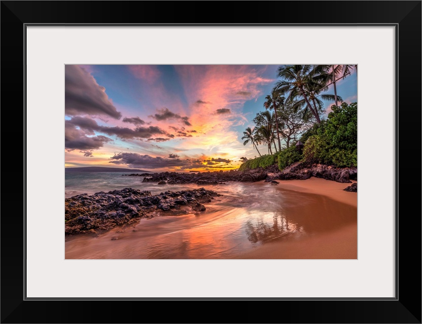 Colorful sunset from secret cove, Maui, Hawaii.