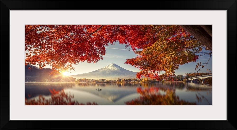 Colorful autumn season and mountain Fuji with morning fog and red leaves at lake Kawaguchiko is one of the best places in ...