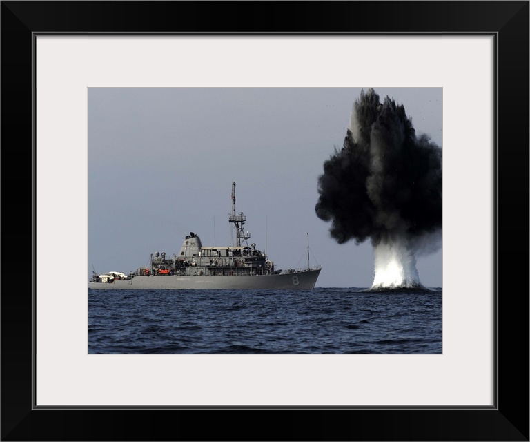 Straits of Hormuz, November 19, 2010 - A demolition charge detonates 1,500 meters from Avenger-class mine countermeasures ...