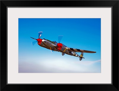 A Lockheed P 38 Lightning fighter aircraft in flight