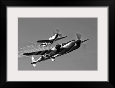 A P 38 Lightning and P 51D Mustang in flight