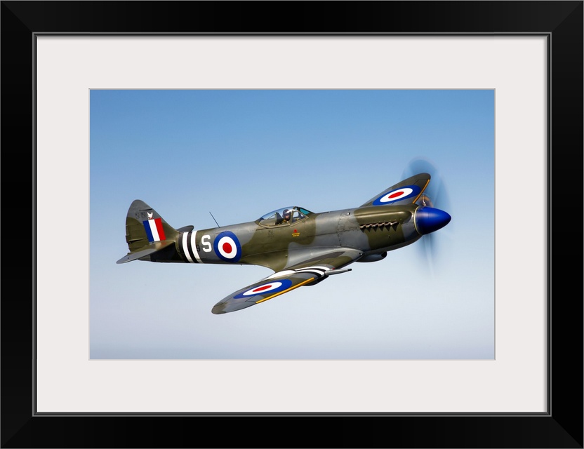 An image of a vintage styled military jet flying through the sky printed on canvas.