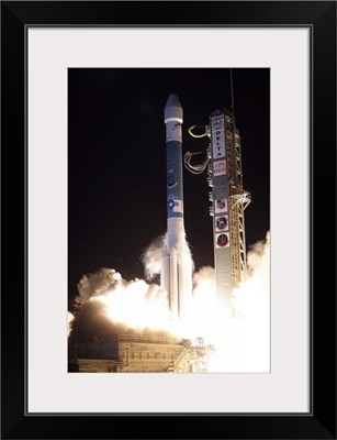 A United Launch Alliance Delta II rocket lifts off from its launch complex