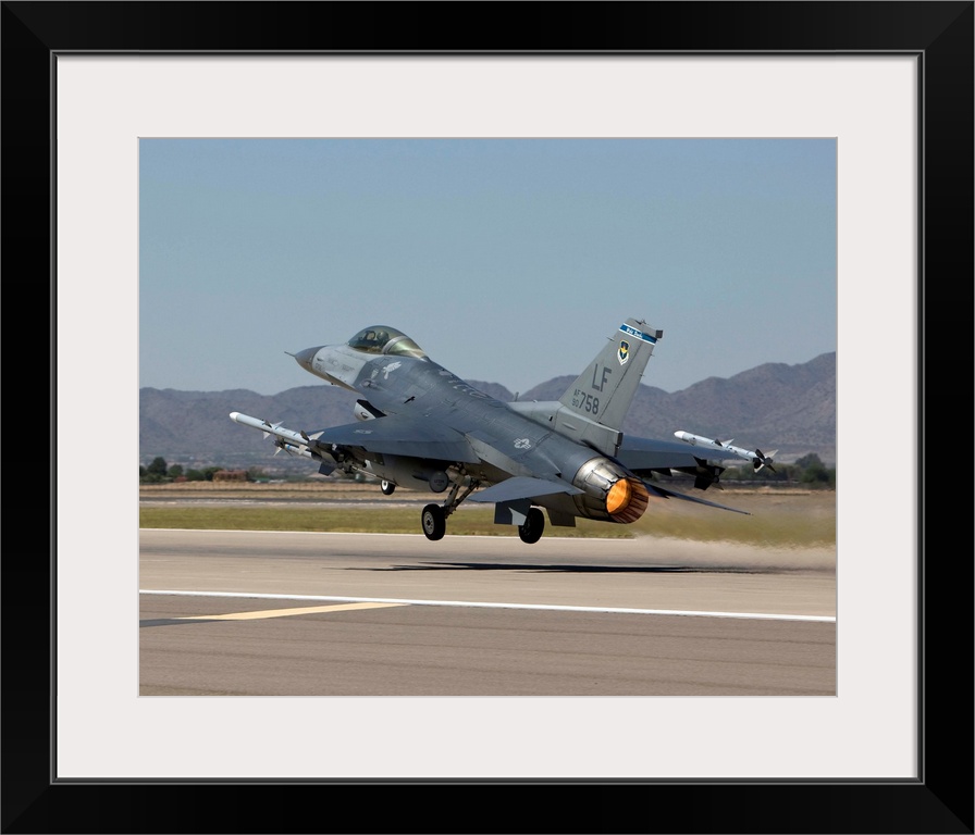 A 56th Fighter Wing F-16 Fighting Falcon from Luke Air Force Base, Arizona, takes off on a training mission.