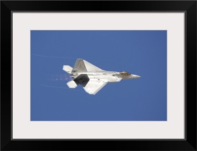 An F-22 Raptor in flight over Nellis Air Force Base, Nevada