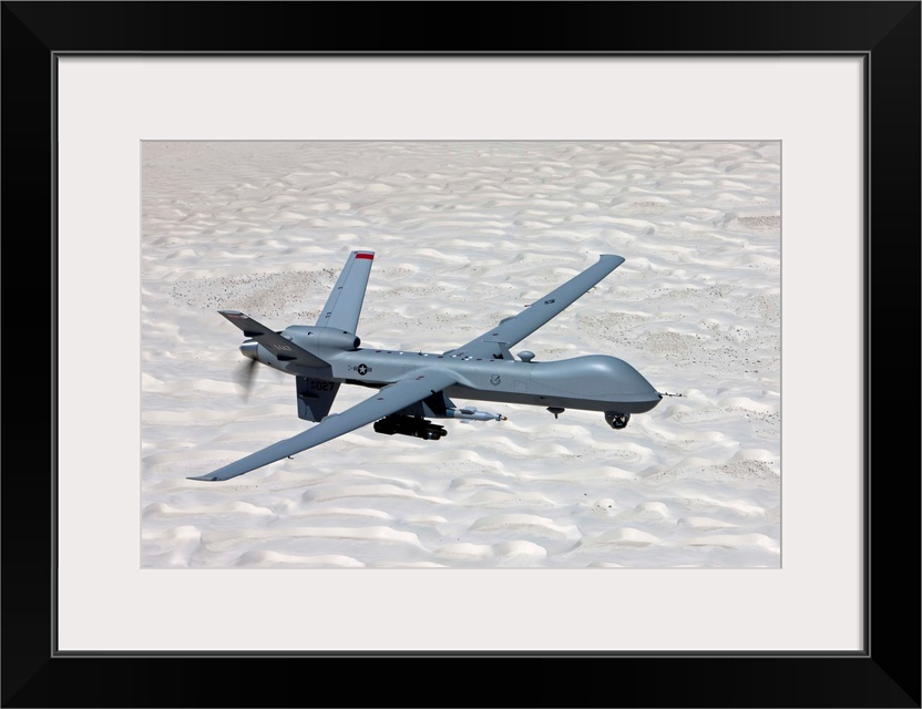 An MQ-9 Reaper flies a training mission over the White Sands National Monument in Southern New Mexico.