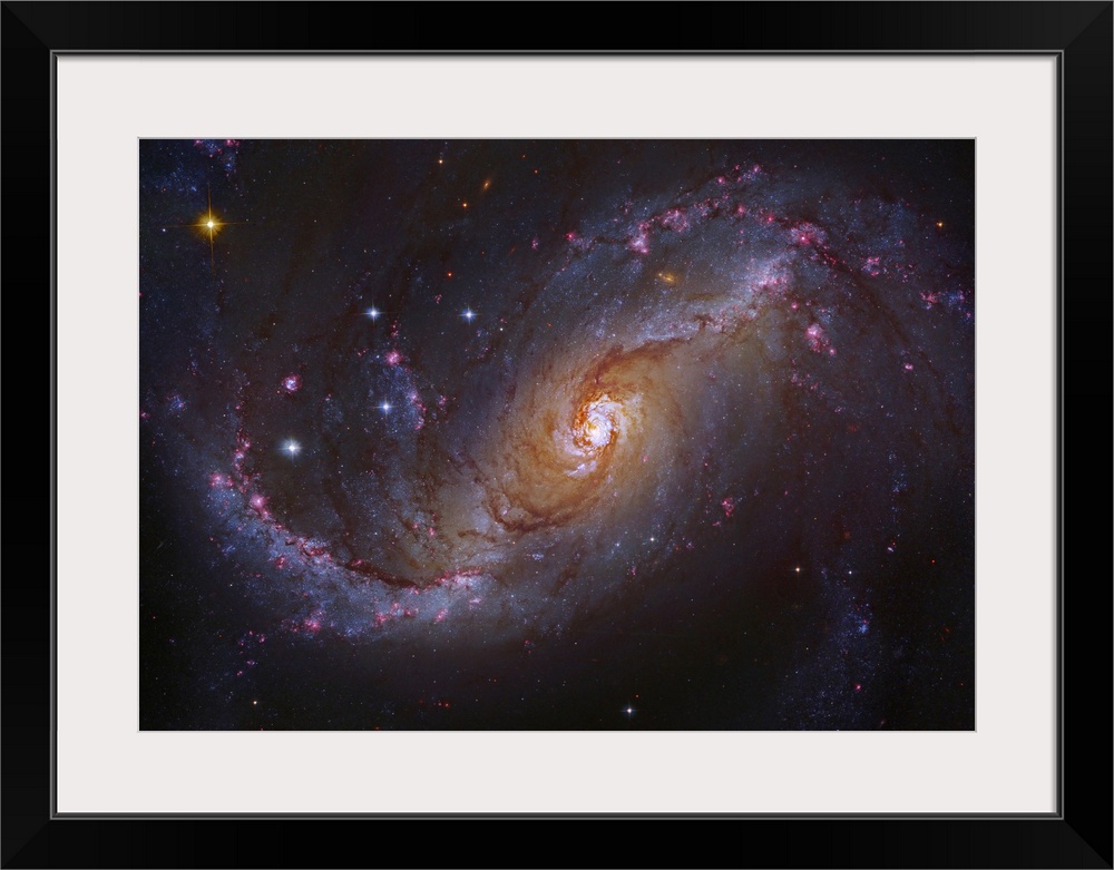 NGC 1672 is a prototypical barred spiral galaxy in the constellation Dorado, and differs from normal spiral galaxies in th...