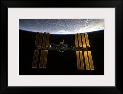 International Space Station backdropped against Earths horizon