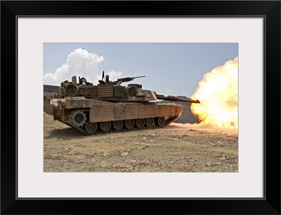 Marines bombard through a live fire range using M1A1 Abrams tanks