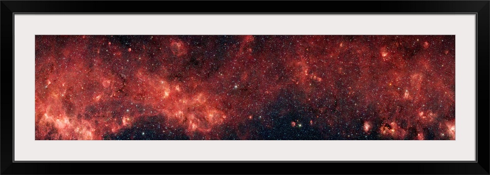 Extremely panoramic shaped photograph of our native galaxy spread out across the sky.