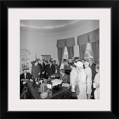 President John F. Kennedy signing the Equal Pay Act