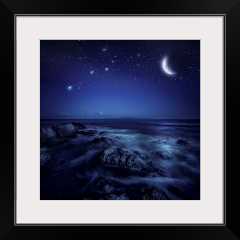 Rising moon over ocean and boulders against starry sky and falling meteorites.