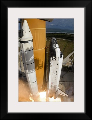 Space Shuttle Atlantis lifts off from its launch pad at Kennedy Space Center Florida