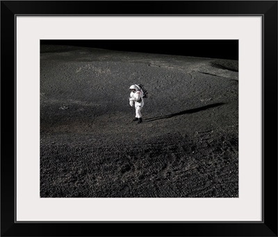 Spacesuit engineer simulates work inside a crater in Johnson Space Centers Lunar Yard