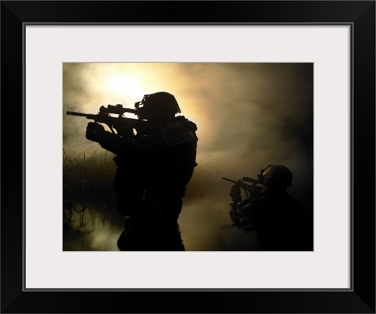 Two military officers are armed with guns as they walk through mist and fog with a faded sun behind them.