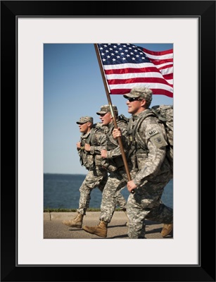 The 191st Military Police Company  carrying the American Flag