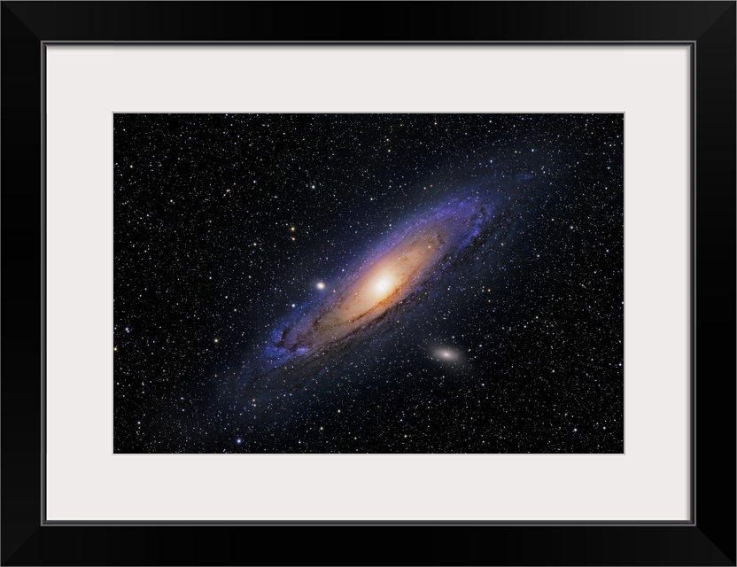 Image of a galaxy amongst many tiny stars printed on canvas.
