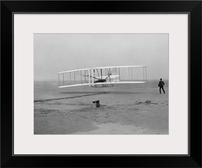 The first flight of the Wright Flyer in 1903