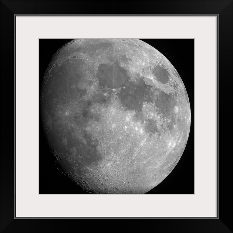 Close up photo of the entire moon with its visible craters and dark spots.