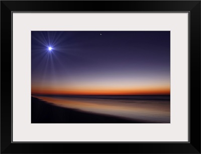 The Moon and Venus at twilight from the beach of Pinamar, Argentina