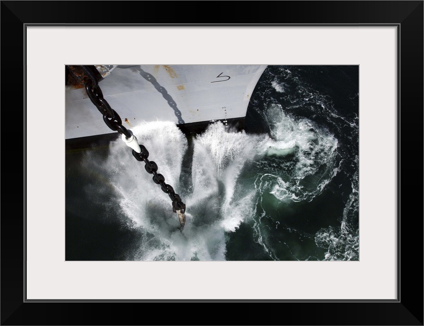 The starboard anchor of USS Ronald Reagan is released into the ocean