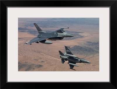 Two F-16s on a training mission over the Arizona desert
