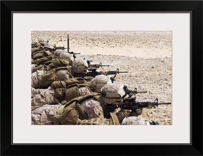 U.S. Marines conduct a battlesight zero their rifles in Al Galail, Qatar