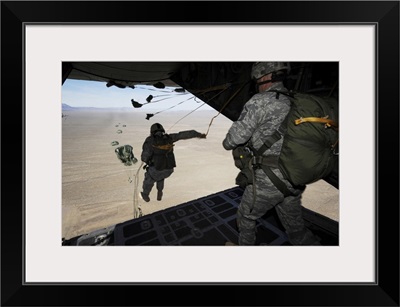 US Airmen Jump From A C-130 Hercules Aircraft Over Nevada