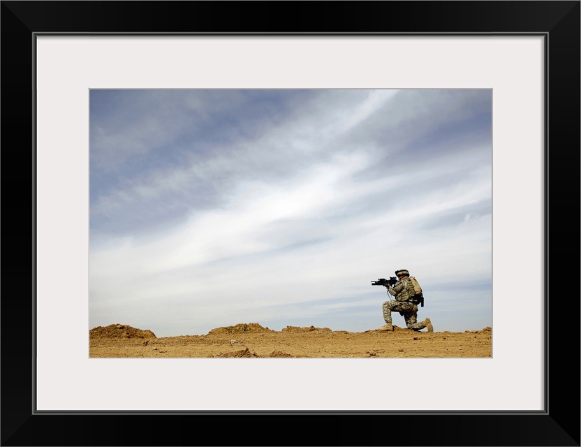 US Army Sergeant provides security during a patrol in Iraq