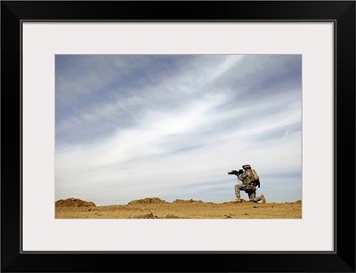 US Army Sergeant provides security during a patrol in Iraq