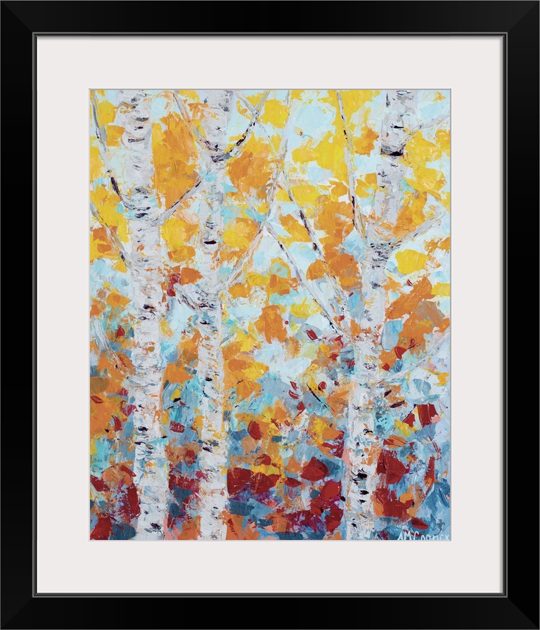 Three white aspen trees with fall leaves.