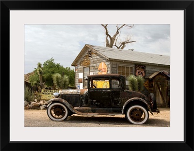 An old automobile in front of the Hackberry General Store along Route 66,  Arizona
