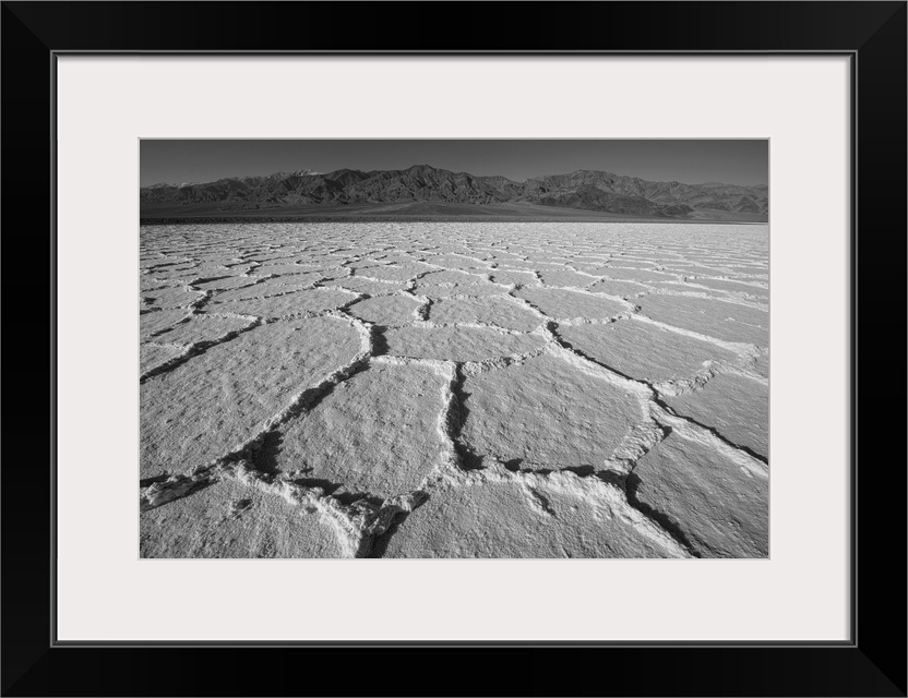 Black and white image of dry salt flats in Death Valley, California.